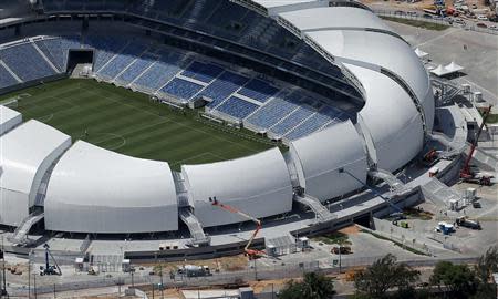 An aerial view shows the Arena das Dunas stadium, which will host matches for the 2014 soccer World Cup, in Natal January 22, 2014. REUTERS/Sergio Moraes