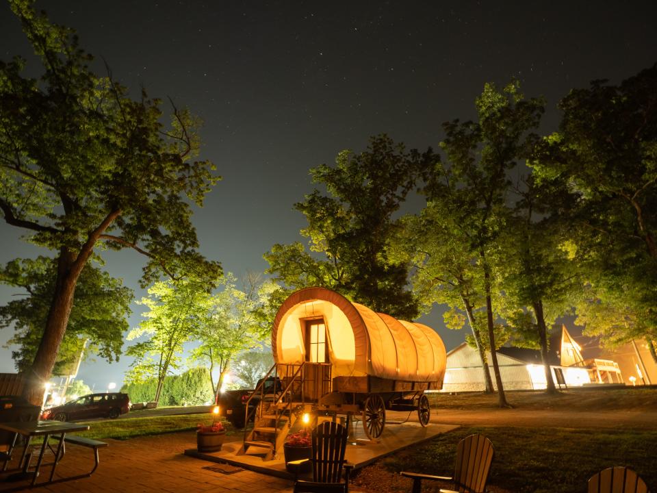 Horse Cave KOA Conestoga Wagon at night