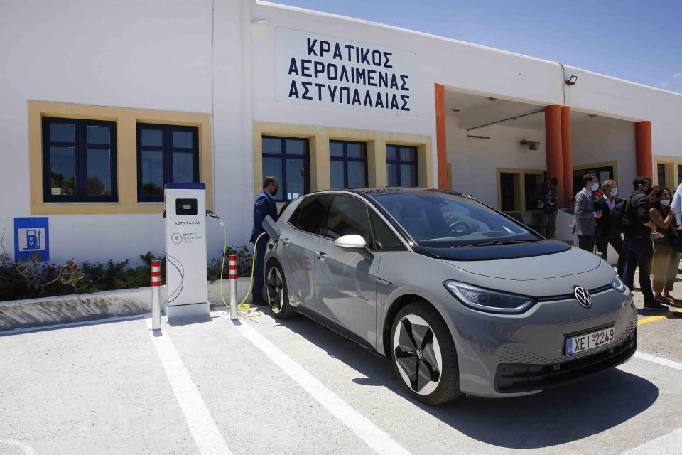 FILE - A Volkswagen ID.4 electric car is seen being charged at the airport of the Aegean Sea island of Astypalea, Greece, for the official launch of a project to introduce and test electric vehicles and sustainable energy systems on Wednesday, June 2, 2021. Consumer Reports says electric SUVs generally are among the least reliable vehicles on the road, but it’s not because of the batteries or electric motors that power them. Compact and plug-in gas-electric hybrids were the most reliable category. (Alexandros Vlachos/Pool via AP, File)