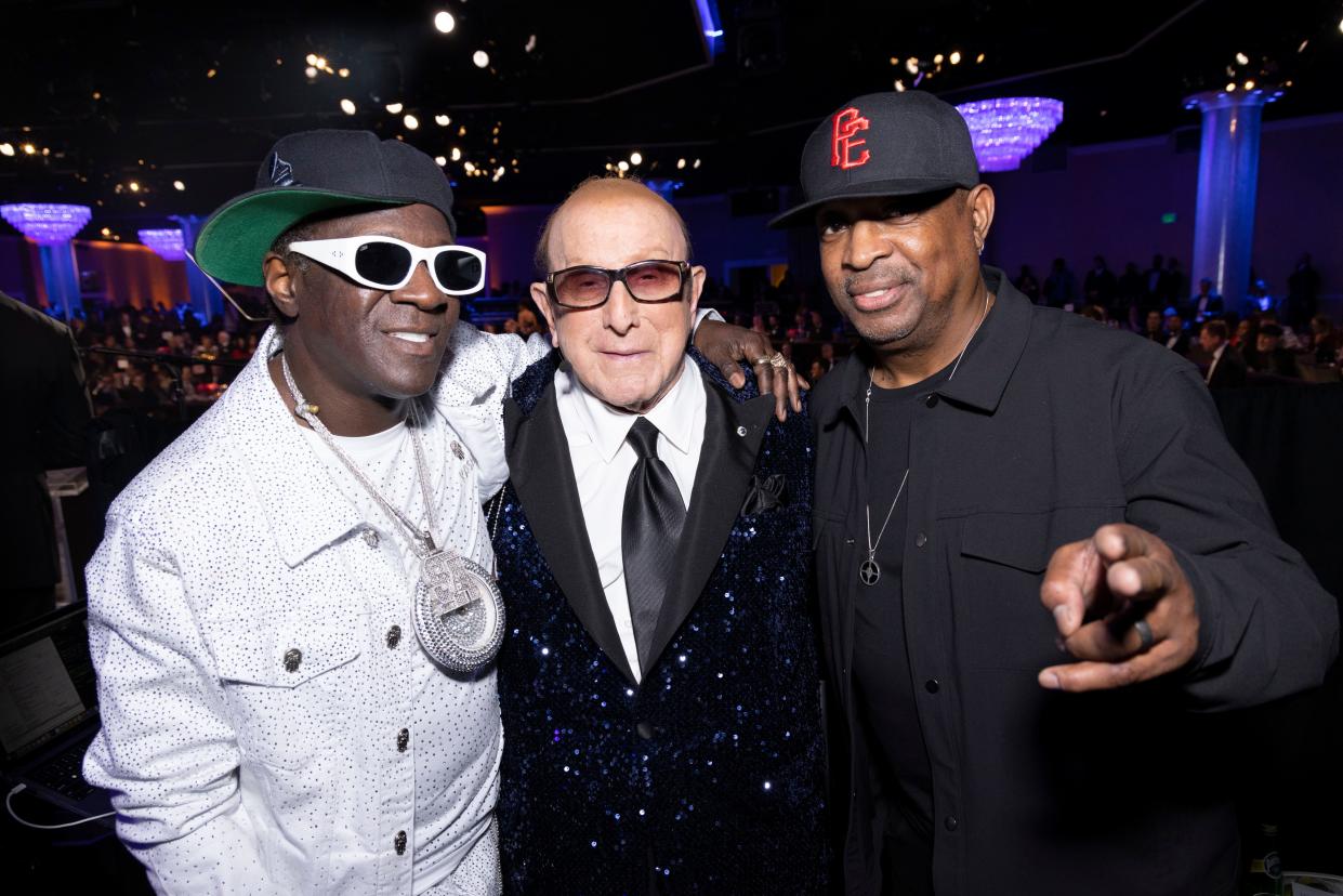 From left: Flavor Flav, Clive Davis and Chuck D attend Davis' annual Pre-Grammy Gala in Beverly Hills, California, on Feb. 3, 2024.