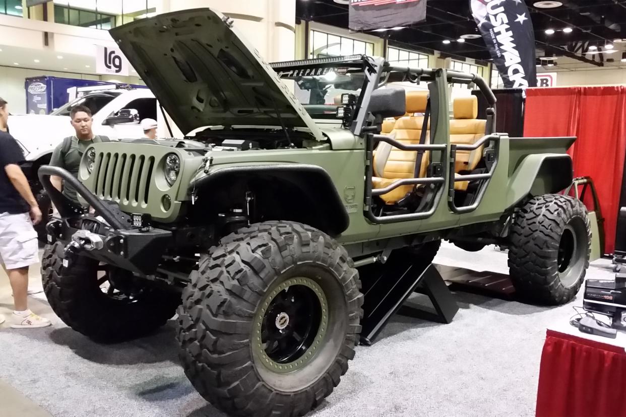 Green Jeep Brusier at a convention.