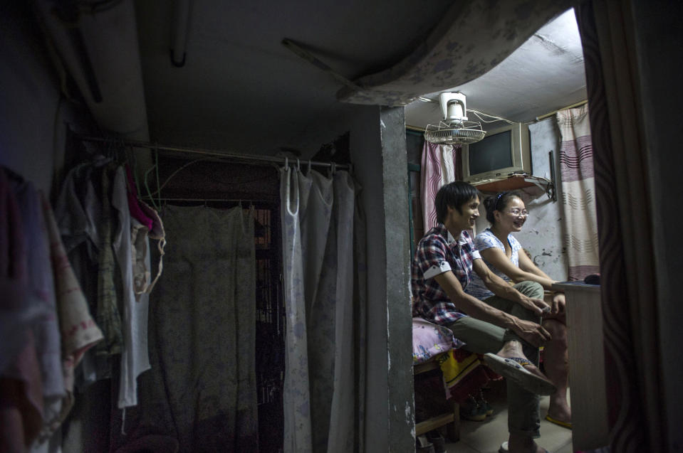 The cramped conditions cost 400 Yuan, or £40 a month (Rex)