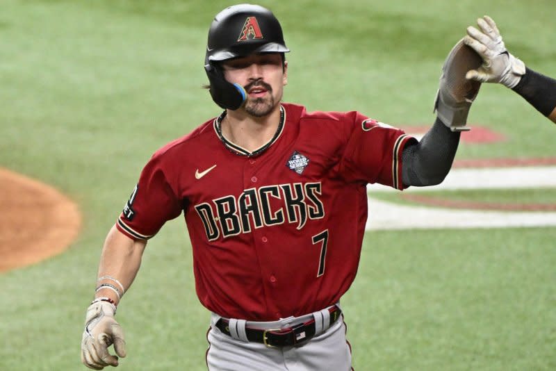 Arizona Diamondbacks rookie outfielder Corbin Carroll excelled under MLB's new rules in 2023, which included a pitch clock and bigger bases, totaling the third-most steals (54) in the league. File Photo by Ian Halperin/UPI