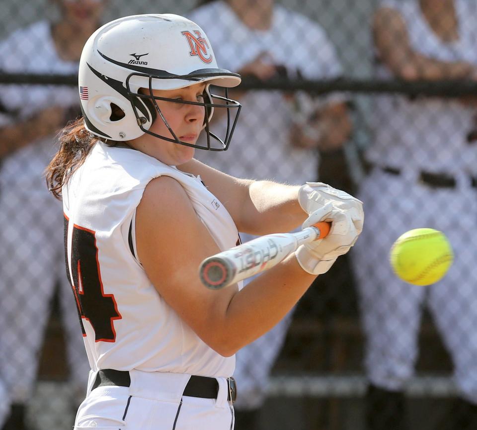 Sadie Carroll of Hoover makes contact with the ball and drives in two runs during their DI sectional final against Madison at Hoover on Wednesday, May 11, 2022.