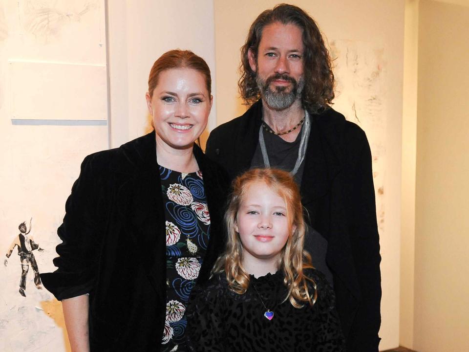 <p>Amy Graves/Getty</p> Amy Adams and her husband, Darren Le Gallo, attend his 2020 exhibition  at the Trigg Ison Fine Art gallery with their daughter Aviana Le Gallo