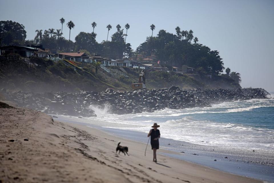 Boulders are in place to protect the rail line and cliffs from further erosion along the coast at San Clemente State Beach