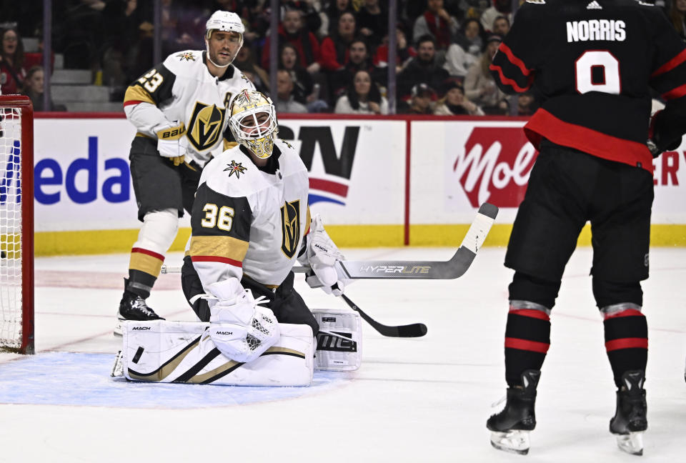 Vegas Golden Knights goaltender Logan Thompson (36) reacts as the puck bounces out of the net after a goal by Ottawa Senators right wing Drake Batherson, not seen, during the second period of an NHL hockey game Saturday, Feb. 24, 2024, in Ottawa, Ontario. (Justin Tang/The Canadian Press via AP)