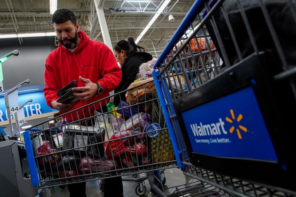 Francisco Santana shops at the Walmart Supercenter in North Bergen, N.J., on Thursday, Feb. 9, 2023. The inflation surge led Santana, a New York City resident, to shift his grocery shopping from local chains to Walmart. (AP Photo/Eduardo Munoz Alvarez) ORG XMIT: NYPM410