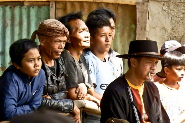 The spectators: The arena was lined with people watching the contests. (