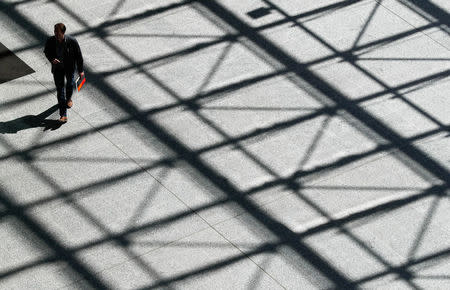 A visitor walks in the main entrance hall of new NATO headquarters during the move to the new building, in Brussels, Belgium April 19, 2018. REUTERS/Yves Herman