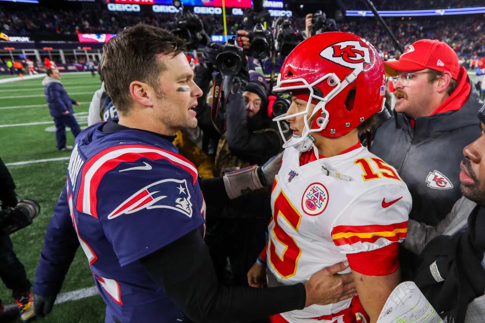 Tom Brady and Patrick Mahomes talk after a regular season game between the Patriots and Chiefs in 2019.