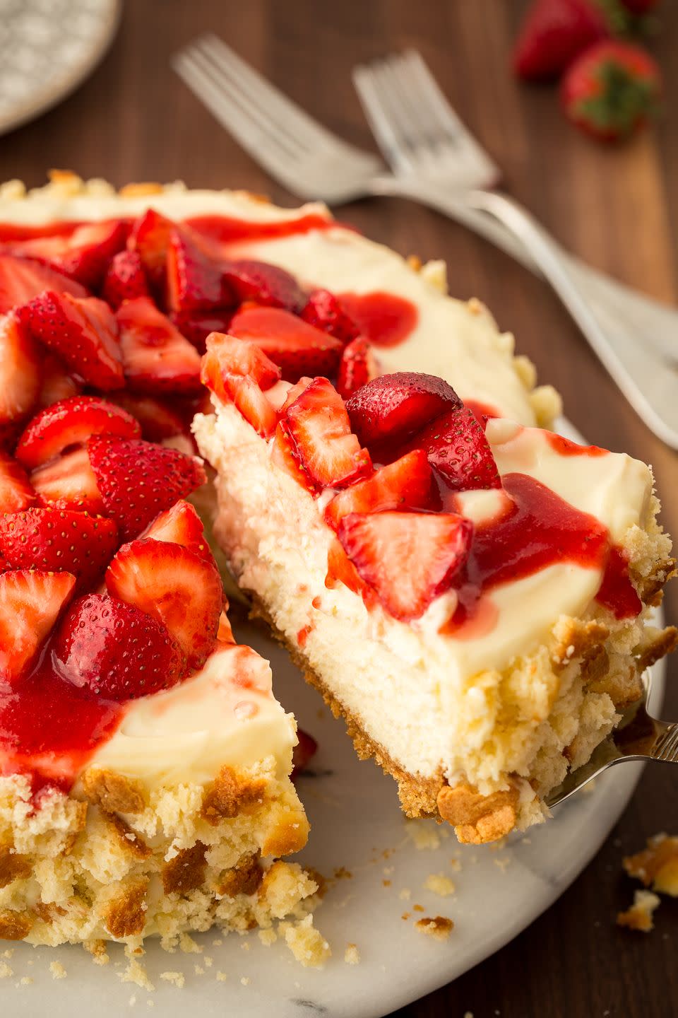 <p>Why eat one dessert when you can combine two? </p><p>Get the recipe from <a href="https://www.delish.com/cooking/recipe-ideas/recipes/a47084/strawberry-shortcake-cheesecake-dessert-recipe/" rel="nofollow noopener" target="_blank" data-ylk="slk:Delish;elm:context_link;itc:0;sec:content-canvas" class="link ">Delish</a>.</p>