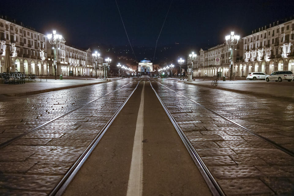 General view shows almost deserted piazza Vittorio. The Italian government puts the whole country on lockdown as Italy is battling COVID-19 coronavirus outbreak. Among other measures against coronavirus spreading, cafes and restaurants are forced to close at six in the evening, and people movements are allowed only for work, for buying essential goods and for health reasons. (Photo by Nicolò Campo/LightRocket via Getty Images)