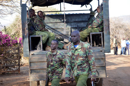 Kenya police officers arrive after they were deployed to guard Sosian ranch following the killing of Tristan Voorspuy a British co–owner of the Sosian ranch in the drought-stricken Laikipia region, Kenya, March 6, 2017. REUTERS/Stringer