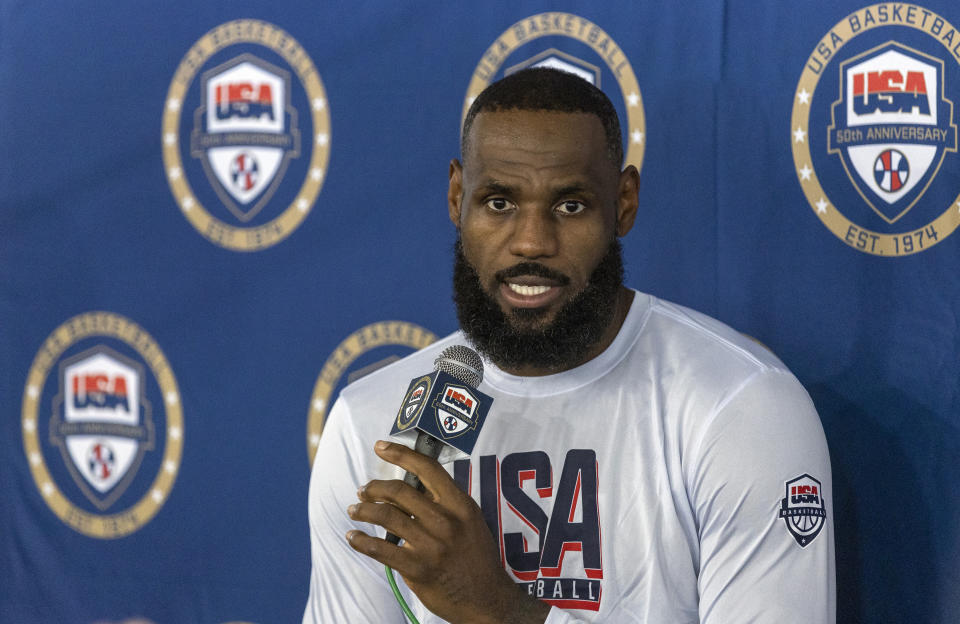 LeBron James, of the Los Angeles Lakers, responds to a question from a reporter during training camp for the United States men's basketball team Saturday, July 6, 2024, in Las Vegas. (AP Photo/Steve Marcus)