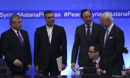 Russian lead negotiator on Syria Alexander Lavrentyev, Iranian Deputy Foreign Minister Hossein Jaberi Ansari, Kazakh Foreign Minister Kairat Abdrakhmanov and U.N. Special Envoy for Syria Staffan de Mistura attend the fourth round of Syria peace talks in Astana, Kazakhstan, May 4, 2017. REUTERS/Mukhtar Kholdorbekov