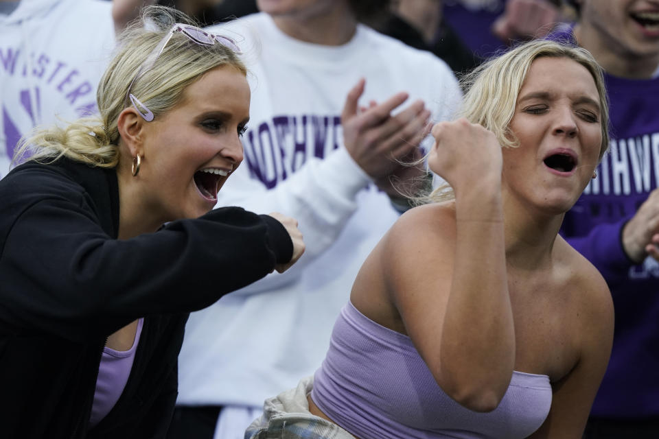 Northwestern fans cheer for their team during the first half of an NCAA college football game against Ohio State, Saturday, Nov. 5, 2022, in Evanston, Ill. (AP Photo/Nam Y. Huh)