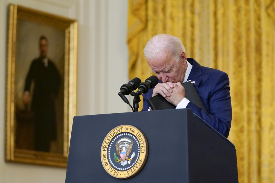 Image: President Joe Biden listens during a press conference following bombings at the Kabul Airport that killed 13 U.S. service members on Aug. 26, 2021. (Evan Vucci / AP file)