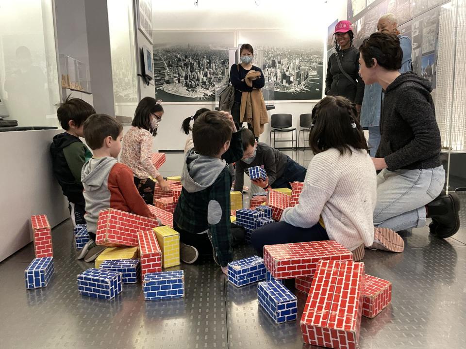 a group of children playing with blocks