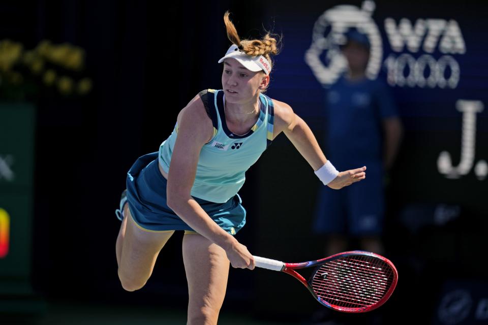 Elena Rybakina of Kazakhistan serves to Magdalena Frech of Poland during a match of the Dubai Duty Free Tennis Championships in Dubai, United Arab Emirates, Wednesday, Feb. 21, 2024. (AP Photo/Kamran Jebreili)