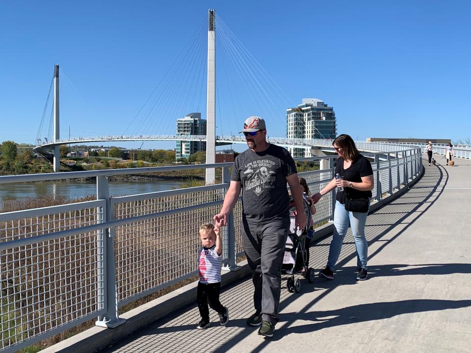 The 3,000-foot-long Bob Kerrey Pedestrian Bridge, shown Oct. 20, 2023, stretches across the Missouri River, connecting parks in Omaha, Nebraska, and Council Bluffs, Iowa.