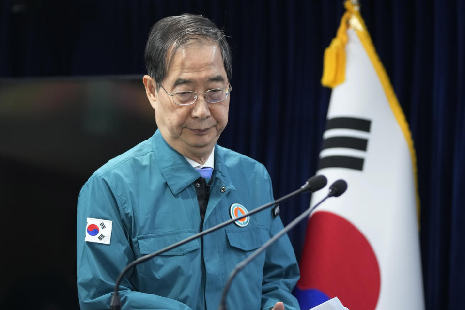 South Korean Prime Minister Han Duck-soo arrives to give a public statement at the government complex in Seoul, South Korea, Thursday, May 16, 2024. A South Korean court ruled in favor of the government's contentious plan to drastically boost medical school admissions on Thursday. (AP Photo/Ahn Young-joon)