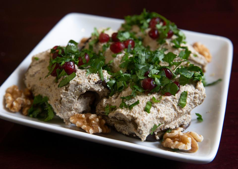 Eggplant rolls with walnut fenugreek garlic paste and fresh pomegranate at The Georgian Chef in Howell.