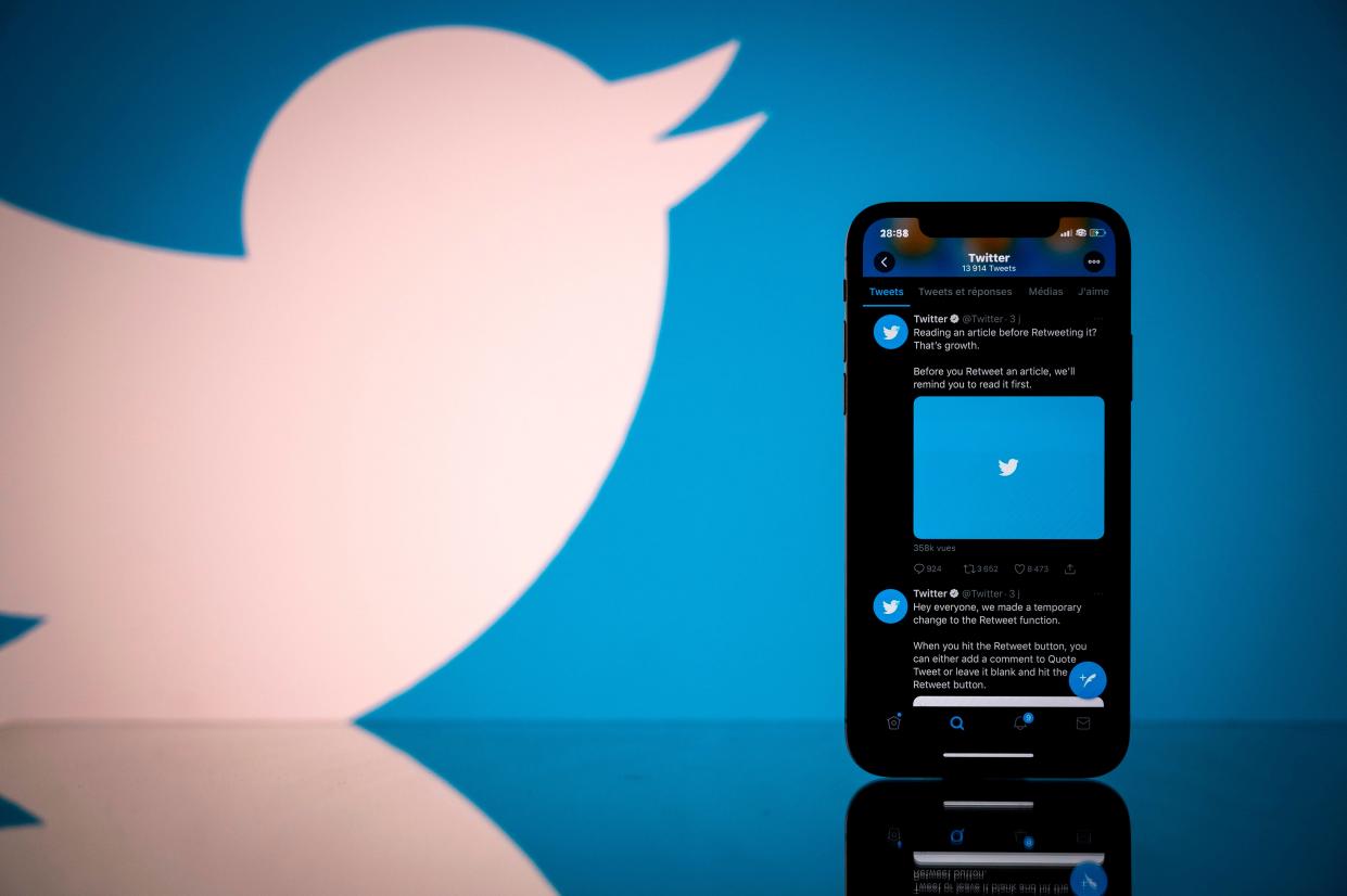 File: The Twitter logo is seen here on the screen of a smartphone and a tablet in Toulouse, France (AFP via Getty Images)