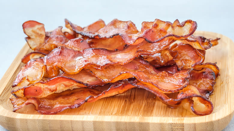 bacon on wooden board