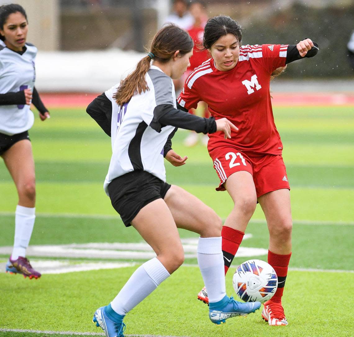 McLane’s Ashlee Salinas, right, defends against Desert during their Central Section playoff game at McLane Stadium on Monday, Feb. 27, 2023.