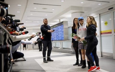 Asylum Seeker Rahaf Mohammed al-Qunun, 18, smiles as she is introduced to the media at Toronto Pearson International Airport - Credit: Getty