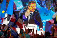 <p>French independent centrist presidential candidate Emmanuel Macron is seen on a large screen as he speaks to his supporters during a campaign rally in Paris, France, Monday, May 1st, 2017. With just six days until a French presidential vote that could define Europe’s future, far-right leader Marine Le Pen and centrist Emmanuel Macron are holding high-stakes rallies Monday. (AP Photo/Christophe Ena) </p>