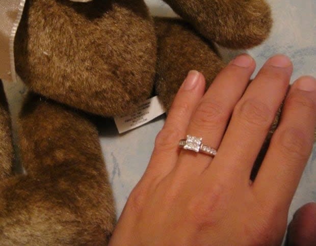 The diamond engagement ring was found in the parking lot of the KFC in Summerside. When Curtis Lynch proposed to his then-girlfriend, Sharon, in 2010, he hid it inside a teddy bear. (Sharon Lynch - image credit)