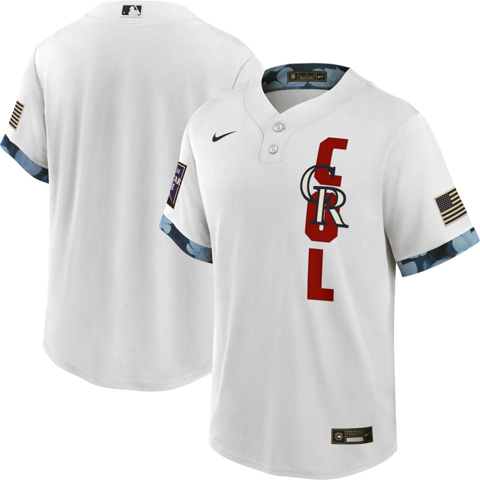 This handout provided by Major League Baseball shows the front and back of the 2021 All-Star jersey unveiled Thursday, June 24, 2021, that will be used for the July 13 game at Denver's Coors Field. The host National League has white jerseys and the American League blue. Major League Baseball is getting rid of club uniforms and caps for the All-Star Game in favor of specially-designed league outfits. (MLB via AP)