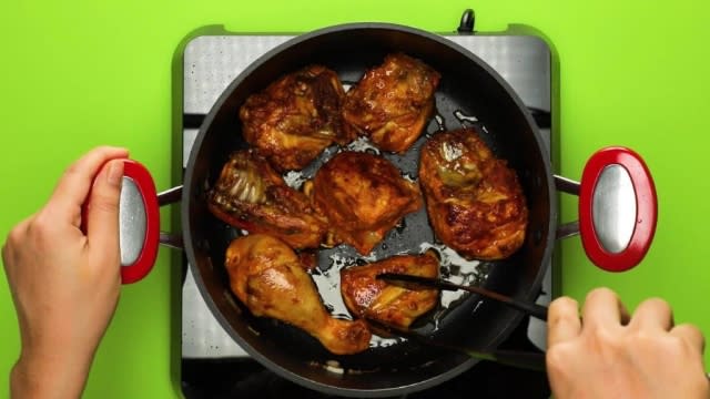 Frying chicken in a pot