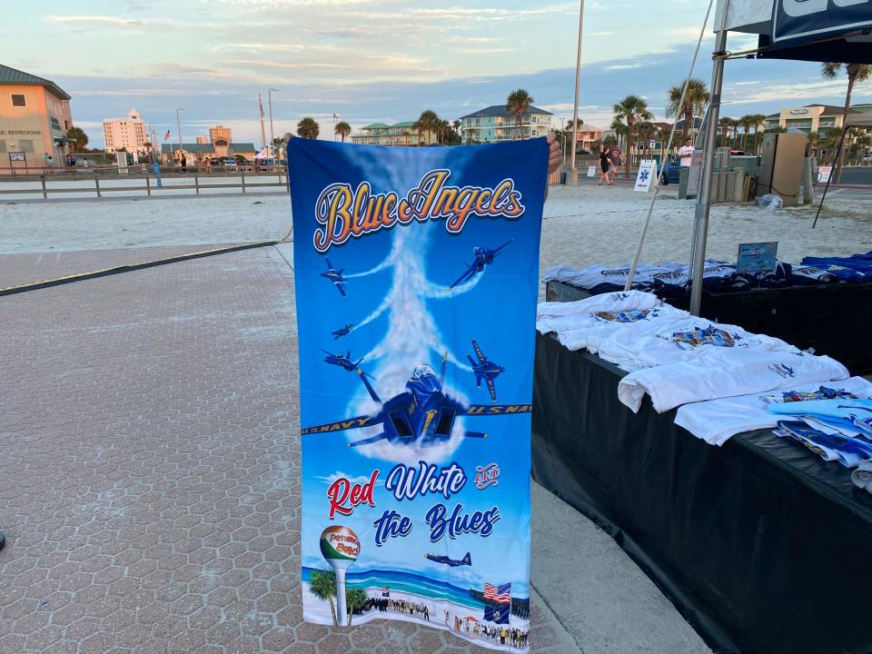 Currin Graphics prints their own Blue Angels shirts and towels specific to the Pensacola Beach Air Show.