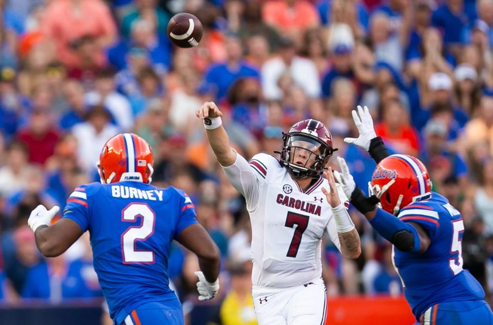 South Carolina quarterback Spencer Rattler (7) gets off a pass against the Florida Gators on Nov. 12. Rattler and the Gamecocks will face Notre Dame on Dec. 30 in the TaxSlayer Gator Bowl.