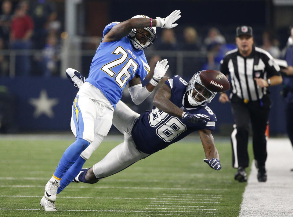 <p>Los Angeles Chargers cornerback Casey Hayward (26) breaks up a pass intended or Dallas Cowboys’ Dez Bryant (88) along the sideline in the second half of an NFL football game, Thursday, Nov. 23, 2017, in Arlington, Texas. (AP Photo/Ron Jenkins) </p>