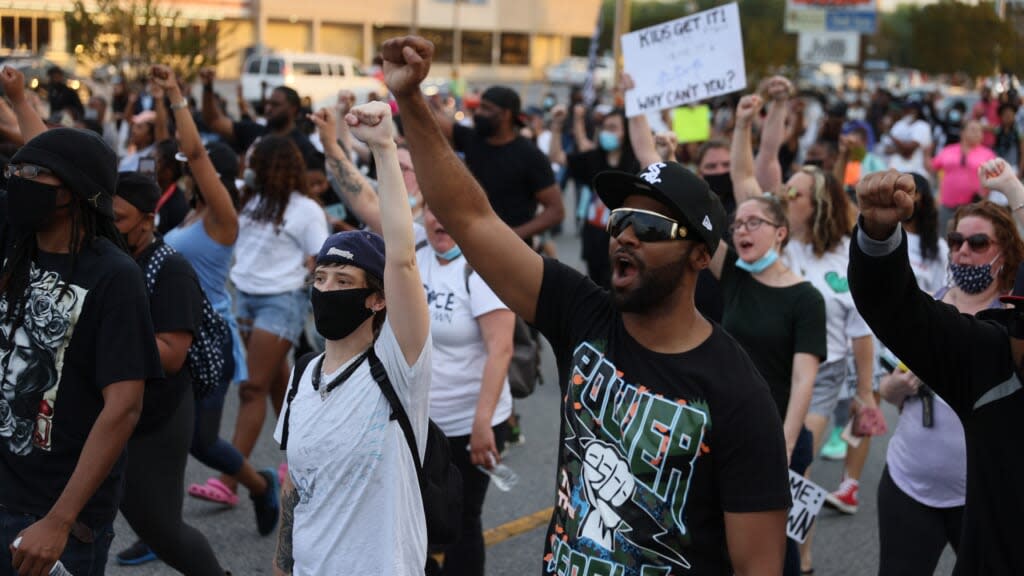Protesters calling for justice in the shooting death of Andrew Brown Jr. by Pasquotank County Sheriff’s deputies march Thursday in Elizabeth City, North Carolina. (Photo by Joe Raedle/Getty Images)