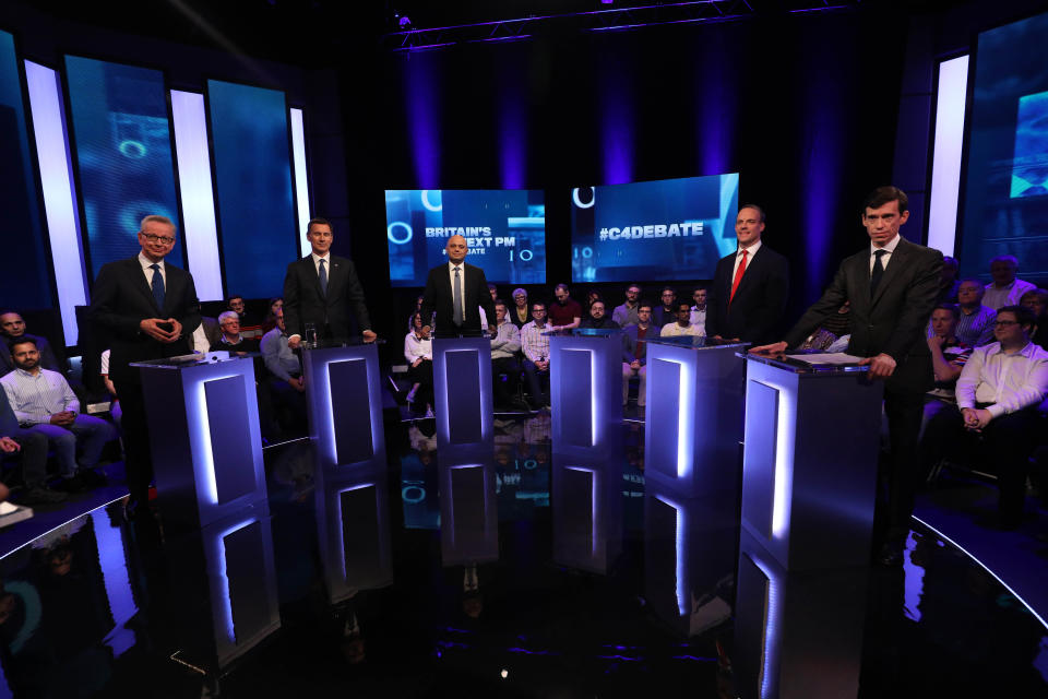 From left to right: Michael Gove, Jeremy Hunt, Sajid Javid, Dominic Raab and Rory Stewart, with an empty plinth representing absent candidate Boris Johnson