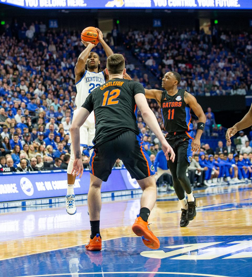 Kentucky guard Cason Wallace (22) dropped in two of his team-high 20 points as the Wildcats faced off against Florida in Rupp Arena on Saturday evening. Kentucky defeated Florida 72-67. Feb. 4, 2023