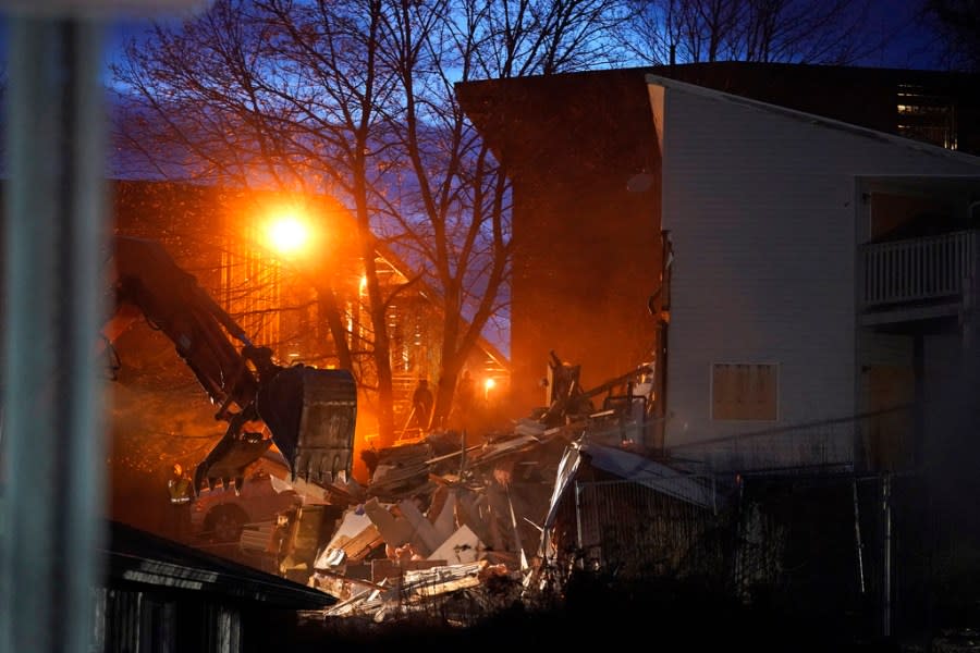 Heavy equipment is used to demolish the house where four University of Idaho students were killed in 2022 on Thursday, Dec. 28, 2023, in Moscow, Idaho. Students Ethan Chapin, Xana Kernodle, Madison Mogen and Kaylee Goncalves were fatally stabbed there in November 2022. (AP Photo/Ted S. Warren)