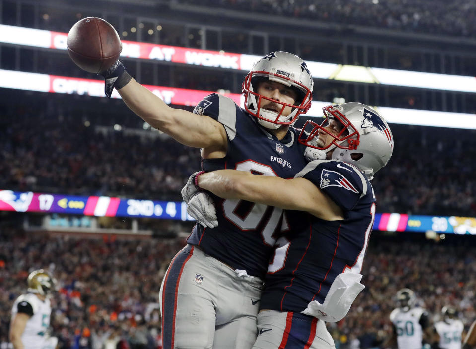 New England Patriots wide receiver Danny Amendola (L) celebrates one of his two fourth-quarter touchdowns in the AFC championship game. (AP)