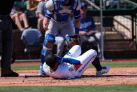 SURPRISE, AZ - MARCH 08: Texas Rangers left fielder Willie Calhoun (5) grabs his face after he's hit by a pitch during the spring training MLB baseball game between the Los Angeles Dodgers and the Texas Rangers on March 8, 2020 at Surprise Stadium in Surprise, Arizona. (Photo by Kevin Abele/Icon Sportswire via Getty Images)