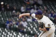 Milwaukee Brewers starting pitcher Corbin Burnes throws during the first inning of a baseball game against the Chicago Cubs Wednesday, April 14, 2021, in Milwaukee. (AP Photo/Morry Gash)