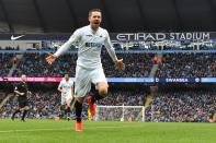 <p>Swansea City’s Gylfi Sigurdsson celebrates scoring the equaliser for Swansea City during the Premier League match between Manchester City and Swansea City at the Etihad Stadium on February 5, Manchester, England. </p>