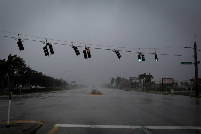 Traffic lights sway in strong wind gusts ahead of Hurricane Ian’s landfall in Fort Myers, Florida, on Sept. 28, 2022.