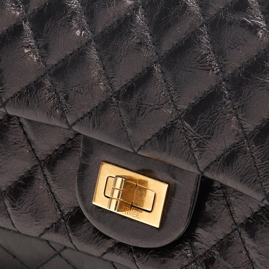 Chanel Reissue 2.55 bag's Mademoiselle Lock