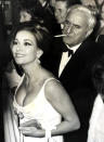<p>The ‘Thunderball’ beauty Claudine Auger and Adolfo Celi, who played the S.P.E.C.T.R.E. villain Emilio Largo, attended the premiere in London on Dec. 29, 1965. (Photo: Getty Images)</p>