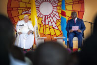 Pope Francis, left, sits with President of the Democratic Republic of the Congo Felix-Antoine Tshisekedi Tshilombo during a welcome ceremony at the "Palais de la Nation" in Kinshasa, Democratic Republic of the Congo, Tuesday, Jan. 31, 2023. Pope Francis starts his six-day pastoral visit to Congo and South Sudan where he'll bring a message of peace to countries riven by poverty and conflict. (AP Photo/Jerome Delay)